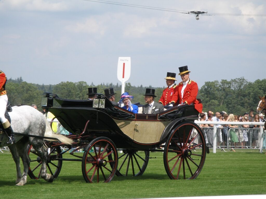 Royal Family on horse and carriage visiting Ascot races