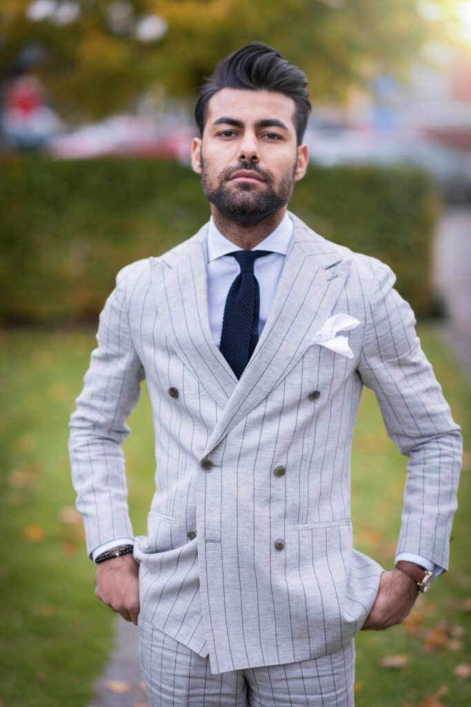 Businessman dressed in a cream striped suit